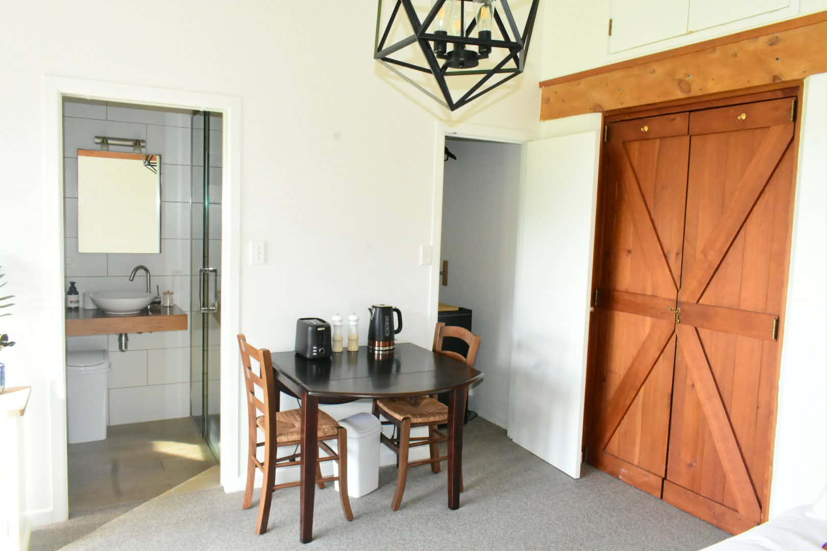 Terra Suite with generous natural light and a glimpse of the water